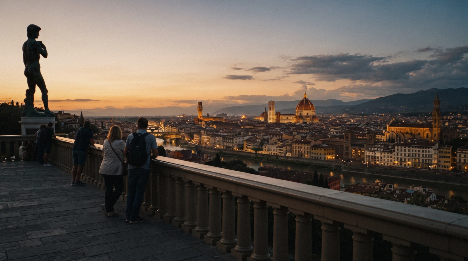 Florence seen from the parapet at Piazzale Michelangelo before sunset, the cathedral dome and the Arno bridges in low warm light