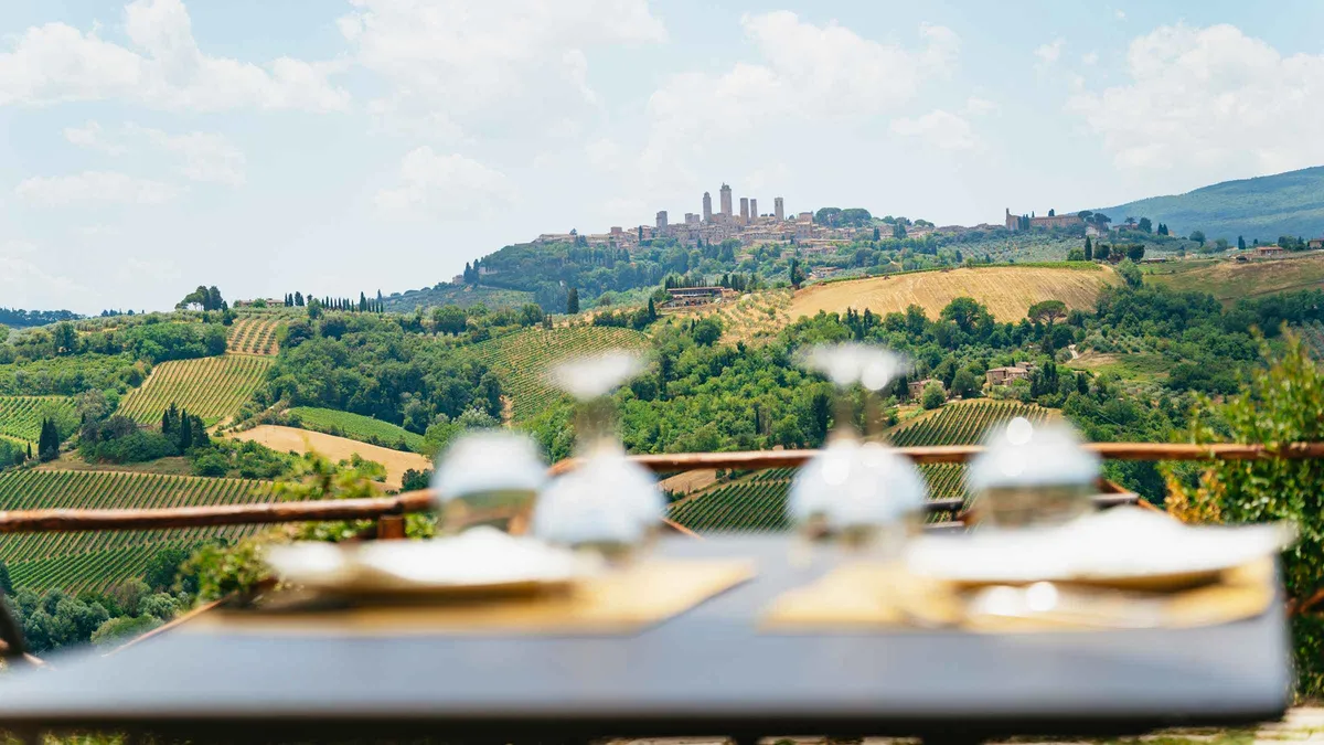 Farmhouse lunch table at a Chianti winery on a Siena, San Gimignano and Pisa day trip from Florence, Italy