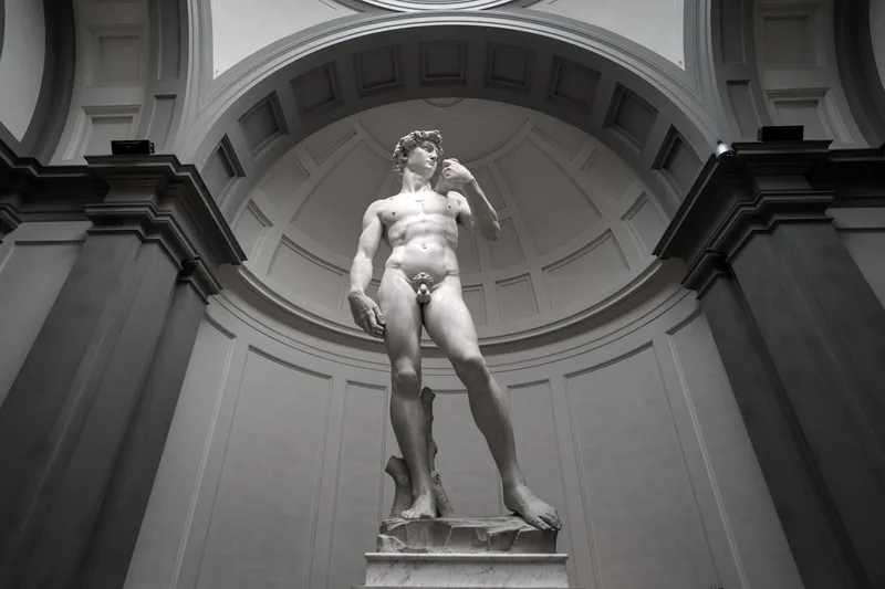 Michelangelo's David under the Accademia Gallery tribune, the room Accademia tickets in Florence, Italy are bought for