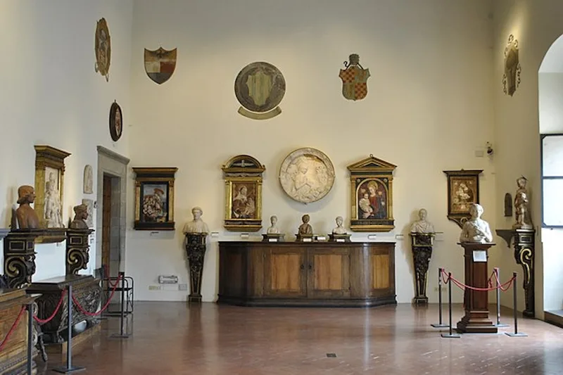 The courtyard and stone staircase of the Bargello museum, a skip-the-line sculpture museum ticket in Florence, Italy
