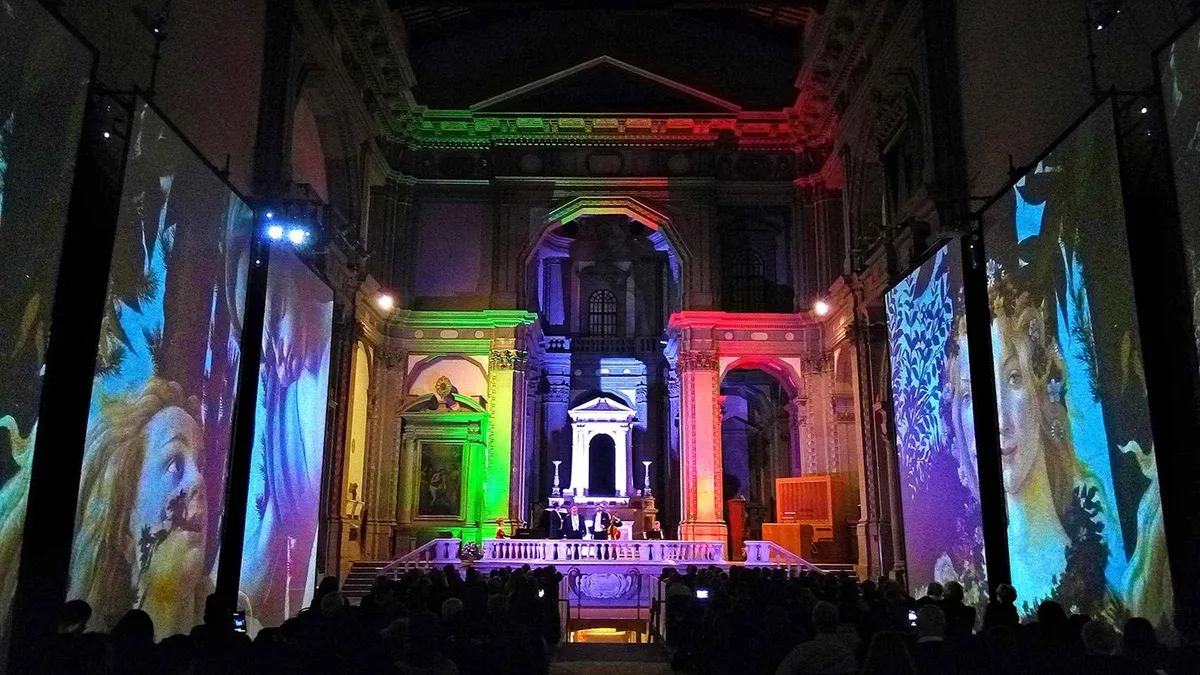 Three tenors performing opera arias with a chamber ensemble in Florence