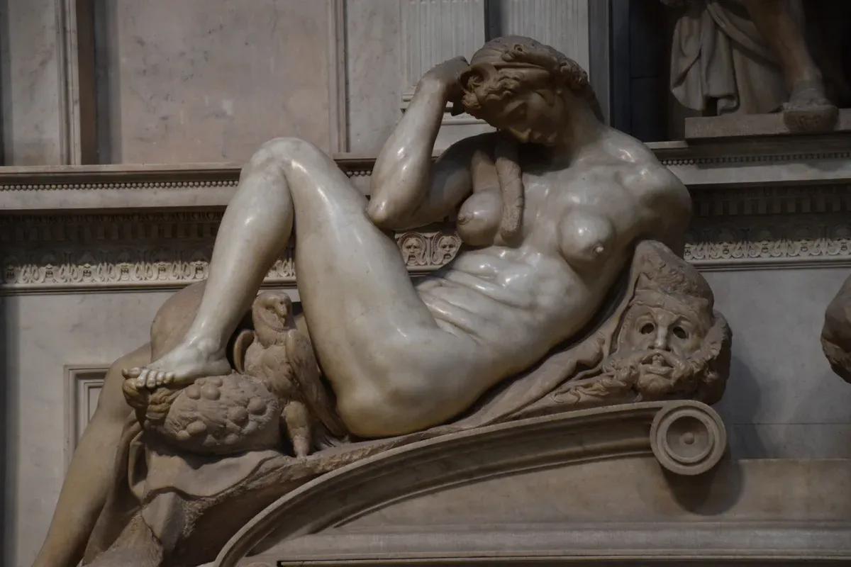 Michelangelo's Night, the reclining marble figure on the tomb of Giuliano de' Medici in the New Sacristy of the Medici Chapels, Florence