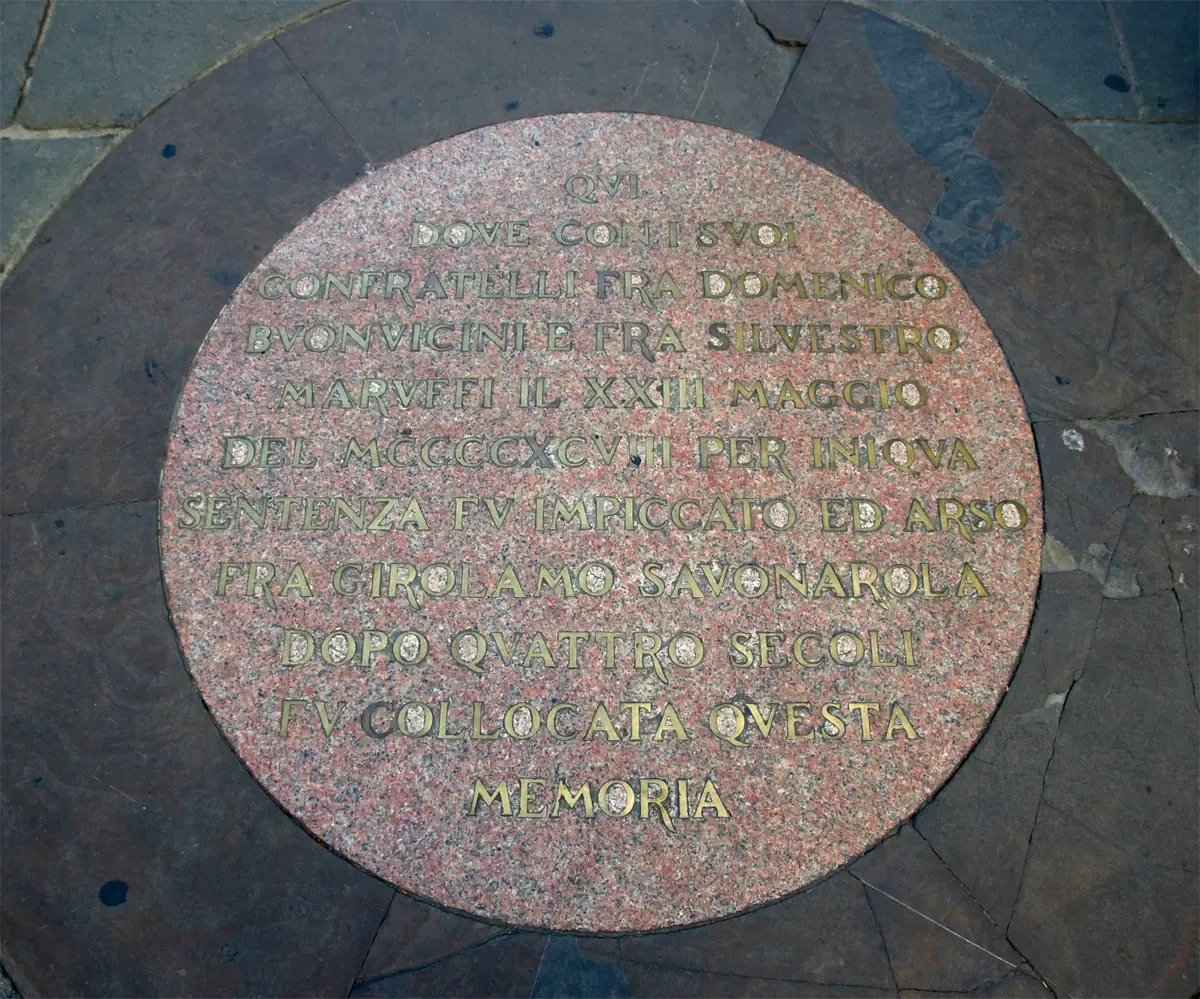 The round marble plaque in the paving of Piazza della Signoria, Florence, marking where Savonarola was executed in 1498