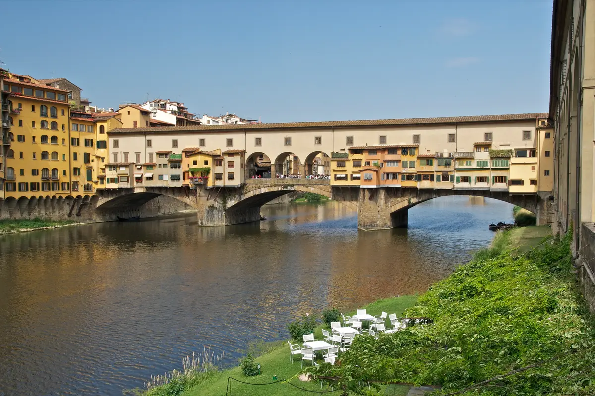 Ponte Vecchio spanning the Arno, its goldsmiths' shops hanging out over the water